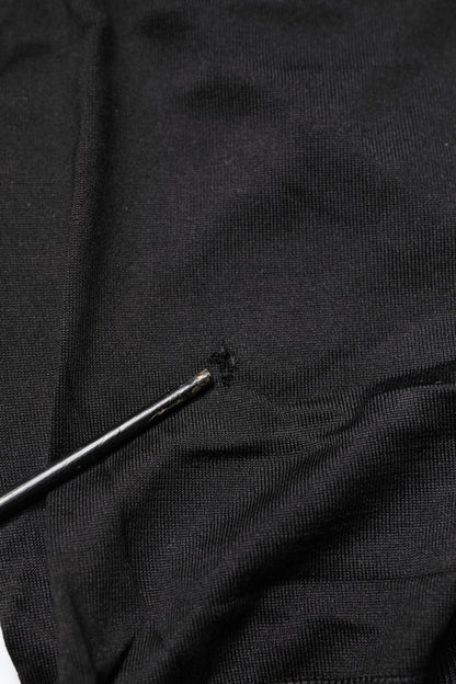 Top noir en dentelle transparente, col rond et sans manches de Dolce & Gabbana