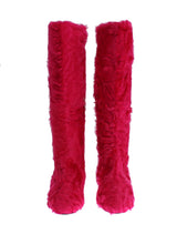 Bottines plates en cuir et fourrure d'agneau rose de Dolce &amp; Gabbana