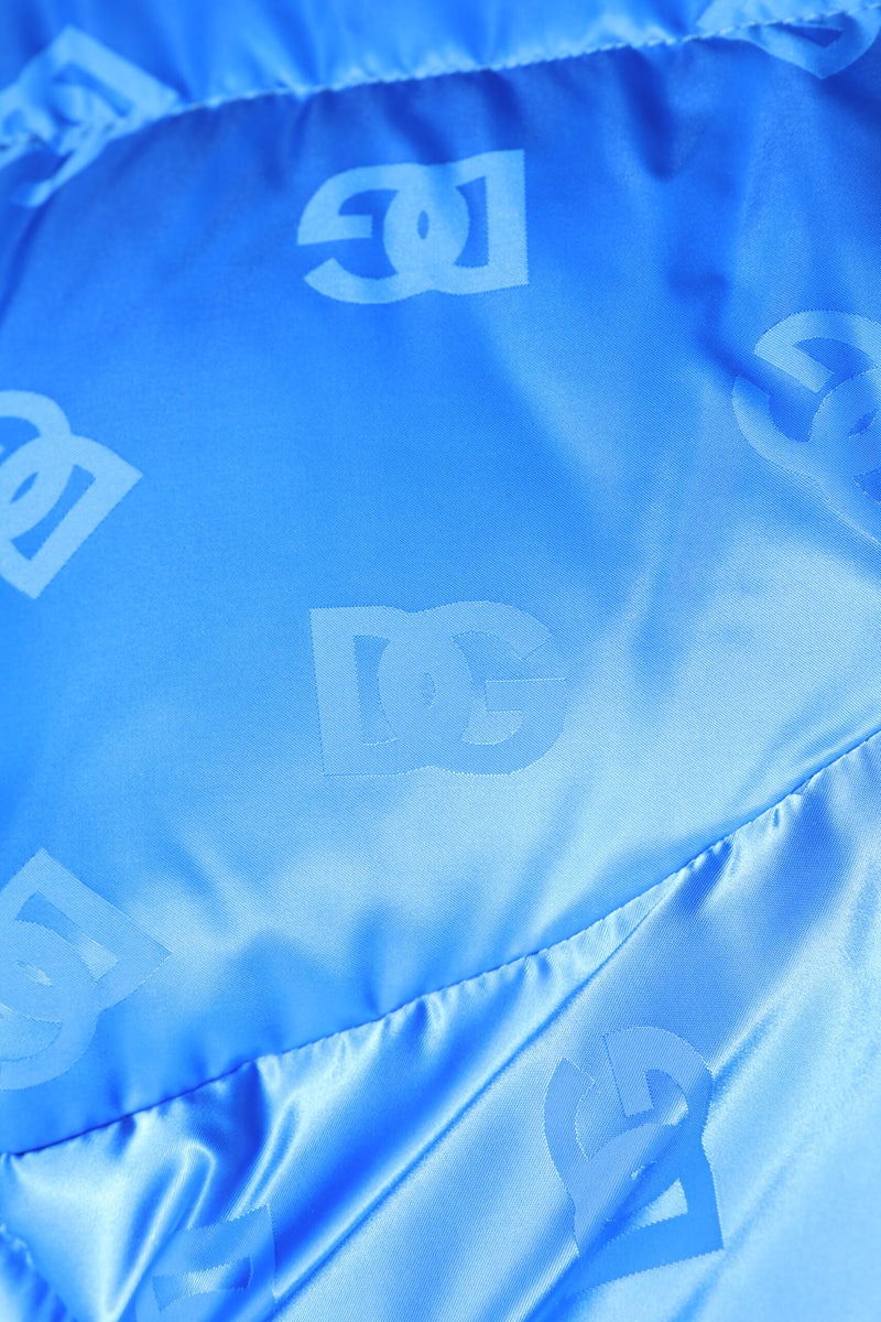 Veste matelassée à capuche zippée avec logo bleu de Dolce & Gabbana