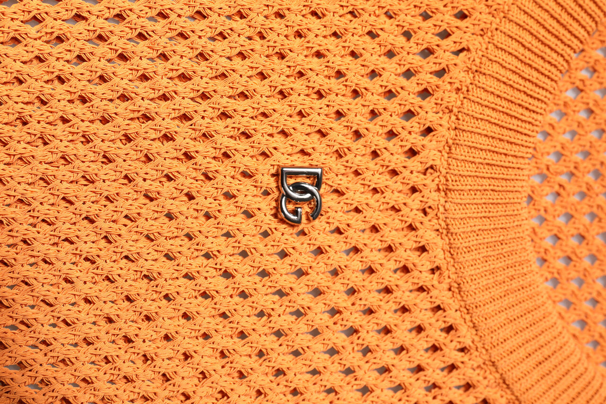 T-shirt orange en cachemire à col rond et sans manches de Dolce &amp; Gabbana