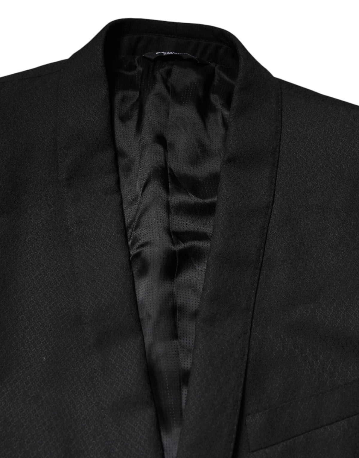 Dolce &amp; Gabbana, veste-blazer noire à simple boutonnage, ornée de détails dorés.