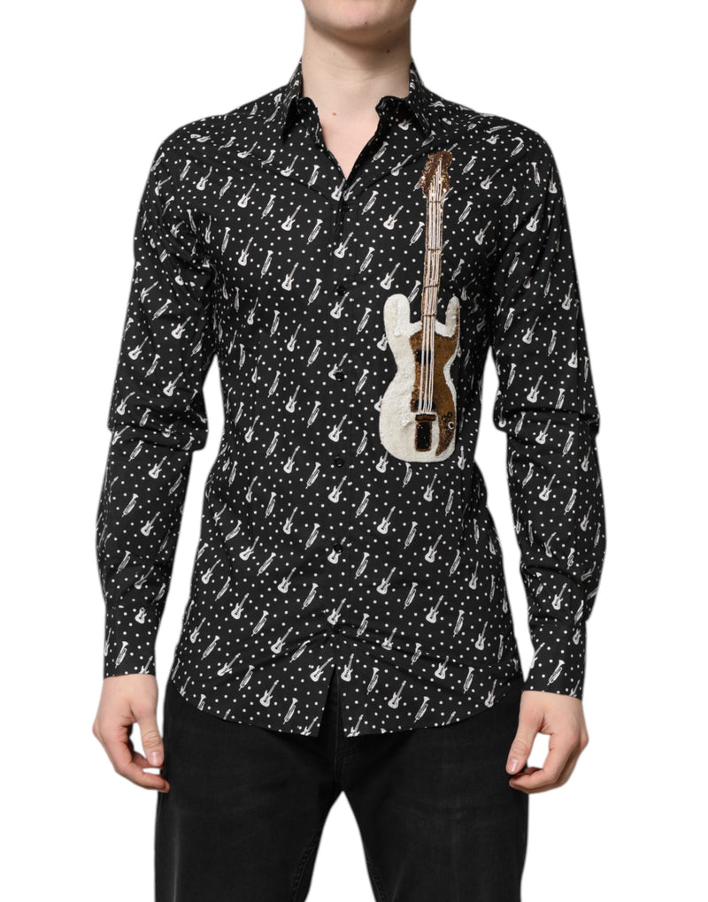 Chemise noire à ornements dorés et broderies de Dolce &amp; Gabbana