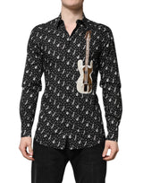 Chemise noire à ornements dorés et broderies de Dolce &amp; Gabbana