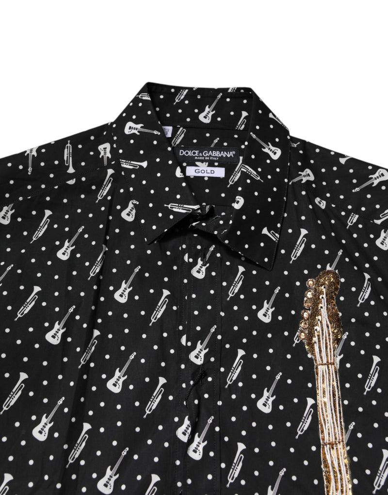 Chemise noire à ornements dorés et broderies de Dolce &amp; Gabbana