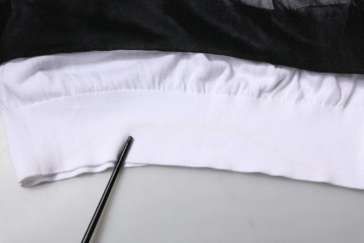 Pull en tricot noir et blanc avec logo Dolce &amp; Gabbana