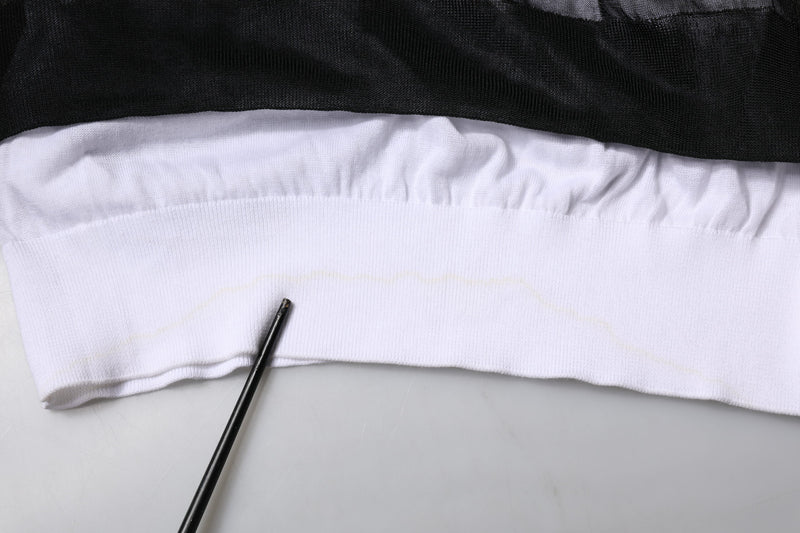 Pull en tricot noir et blanc avec logo Dolce &amp; Gabbana