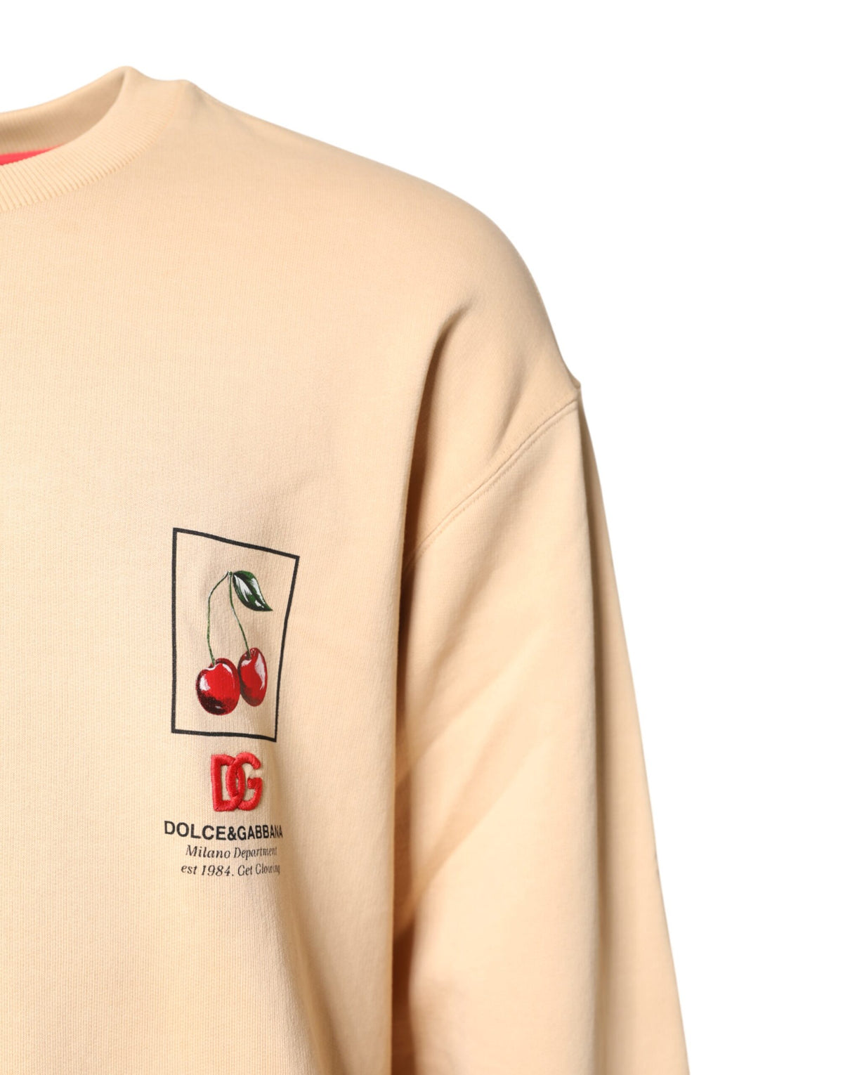 Pull en jersey à col rond beige avec imprimé cerise de Dolce &amp; Gabbana
