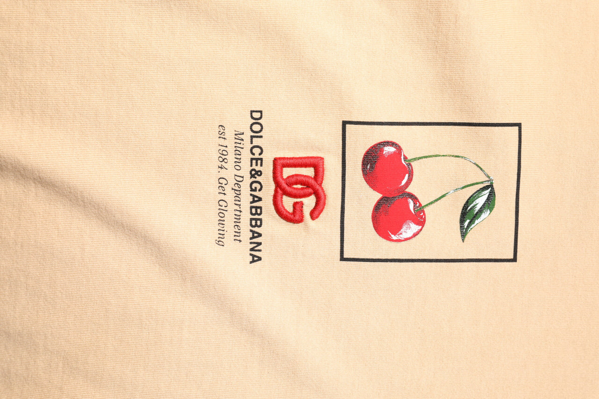 T-shirt à col rond en coton beige avec imprimé du logo de Dolce &amp; Gabbana
