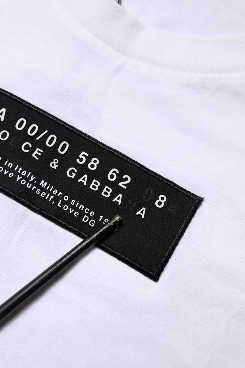 Dolce &amp; Gabbana wit katoenen T-shirt met logo patch en ronde hals.