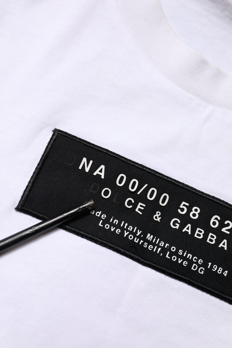 Dolce &amp; Gabbana wit katoenen T-shirt met logo patch en ronde hals.