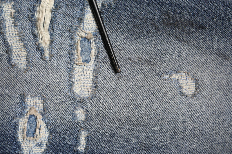 Jean homme en coton bleu délavé et déchiré Dolce &amp; Gabbana
