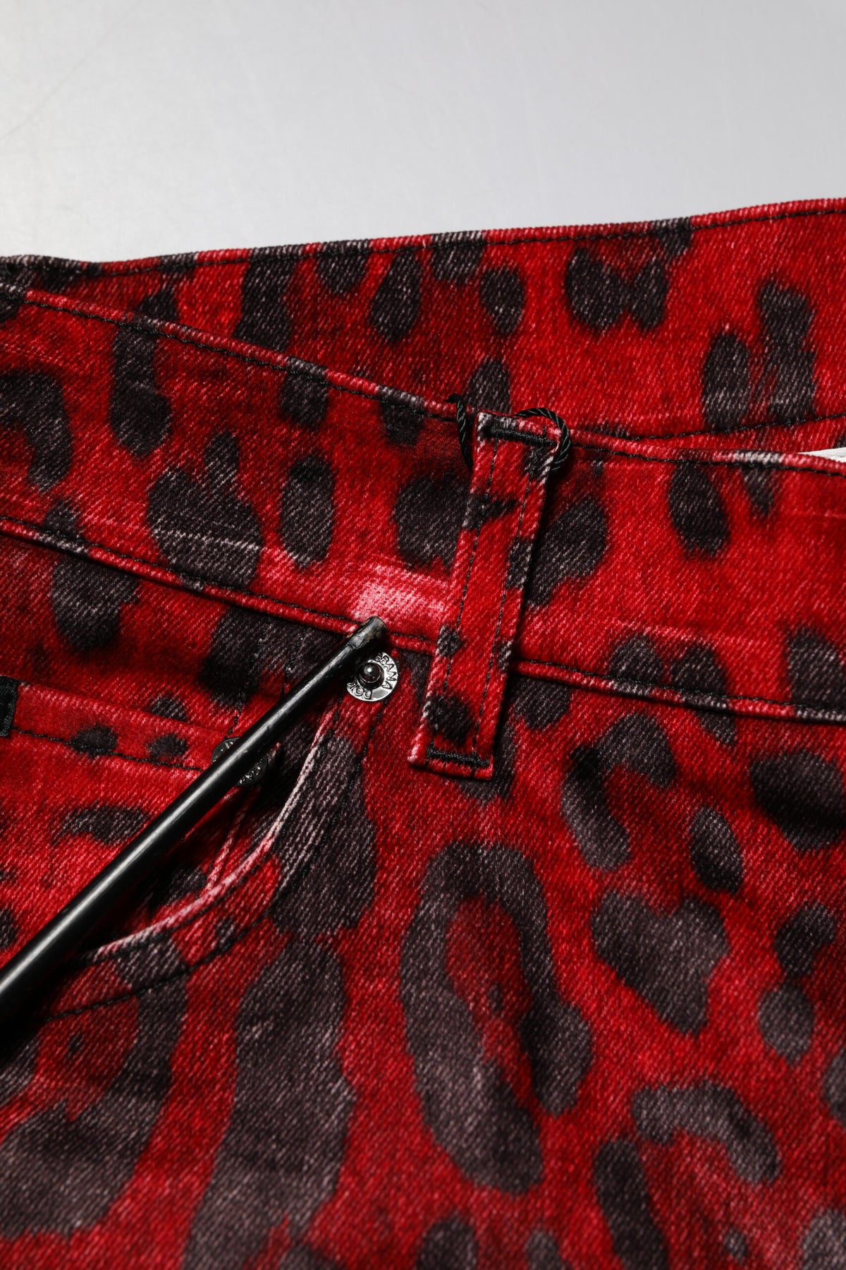 Jeans skinny en coton à imprimé léopard rouge de Dolce &amp; Gabbana