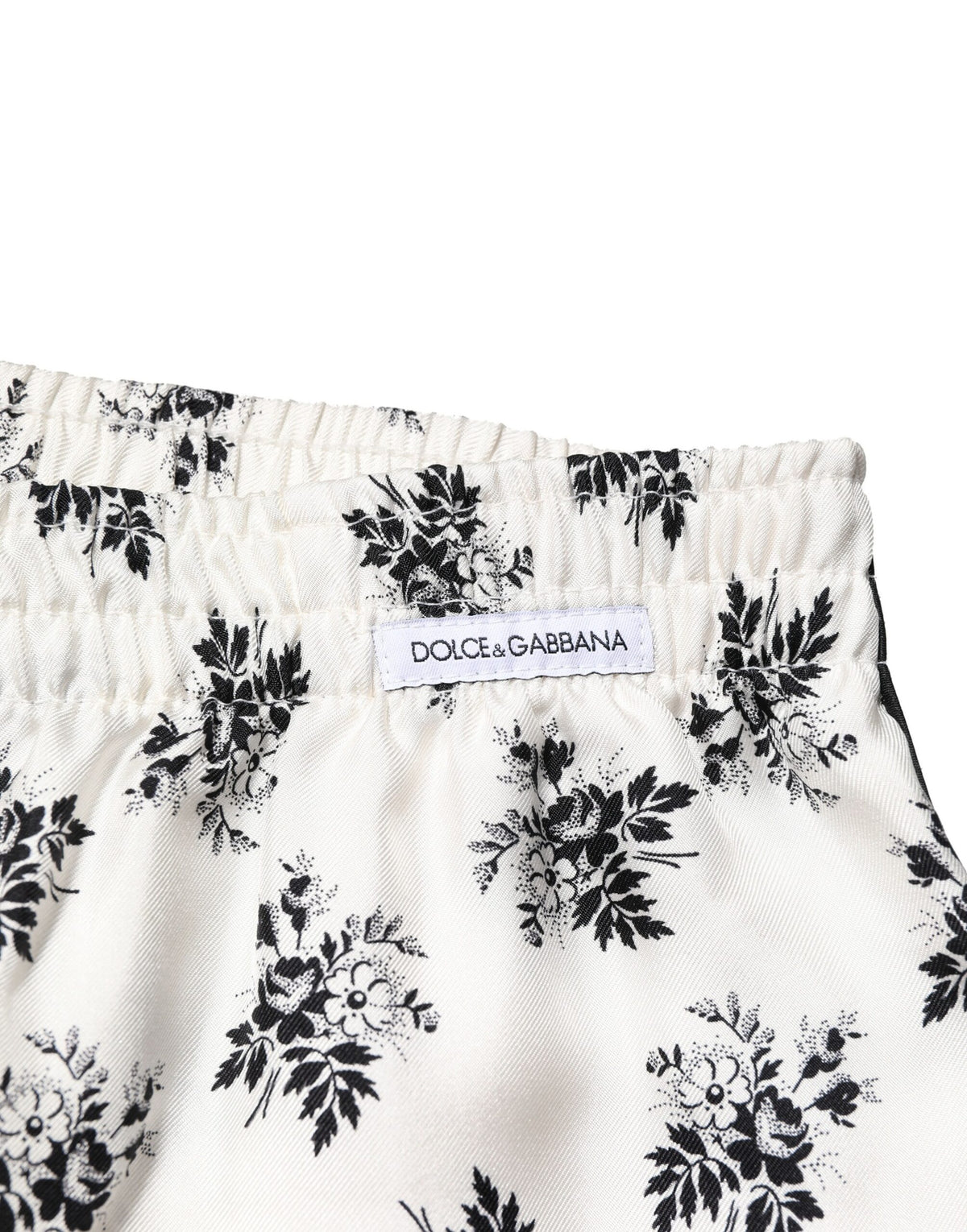 Pantalon de détente en soie à motifs floraux blancs de Dolce &amp; Gabbana