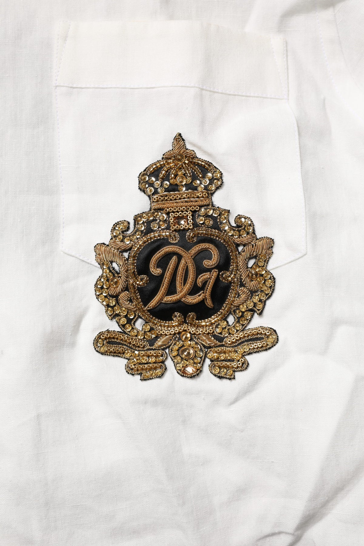 Chemise habillée blanche Dolce &amp; Gabbana, ornée de la couronne DG.