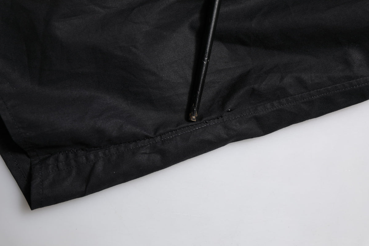Chemise robe à manches longues en coton noir avec détail doré de Dolce &amp; Gabbana