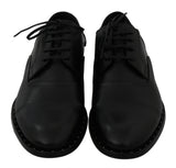 Dolce &amp; Gabbana Chaussures habillées derby en cuir noir