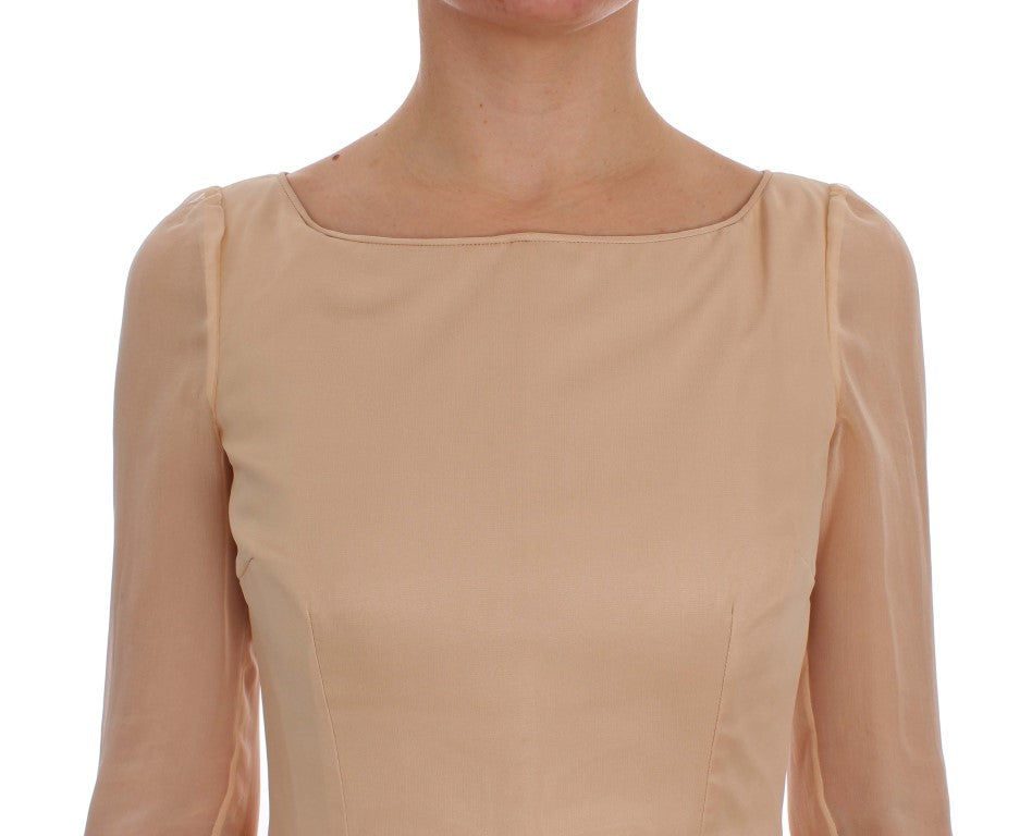 Robe de bal beige en soie de Dolce & Gabbana, longueur maxi.