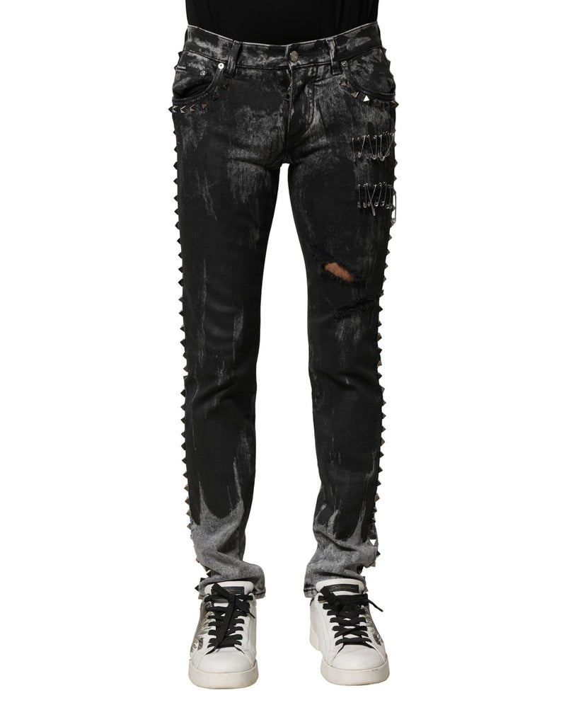 Jeans skinny en jean noir délavé et ornés de strass de Dolce &amp; Gabbana