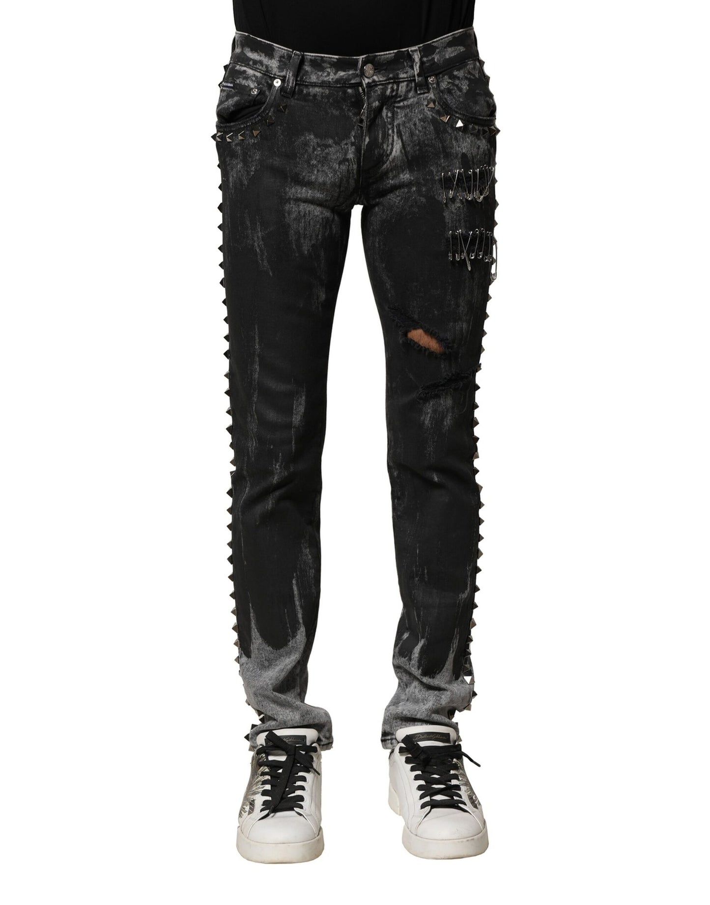 Jeans skinny en jean noir délavé et ornés de strass de Dolce &amp; Gabbana