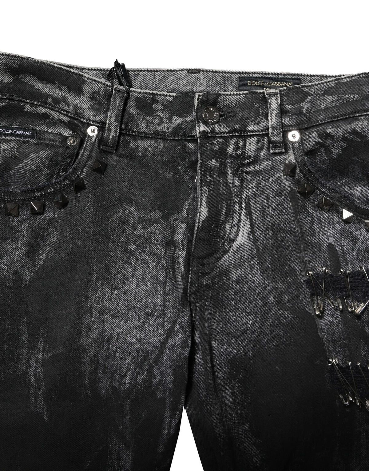 Jeans skinny en jean noir délavé et ornés de strass de Dolce &amp; Gabbana