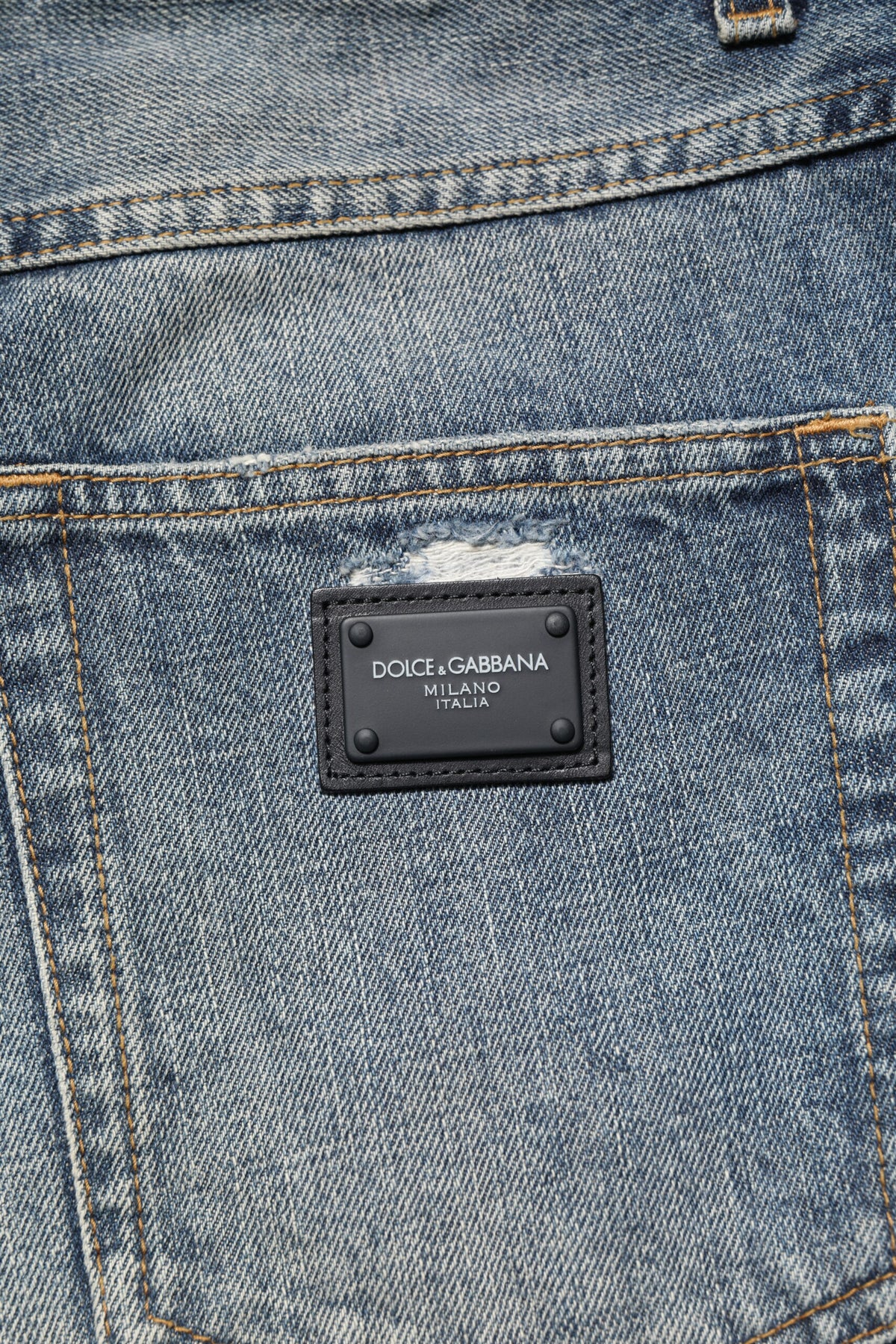 Jean droit en jean délavé et déchiré bleu de Dolce &amp; Gabbana