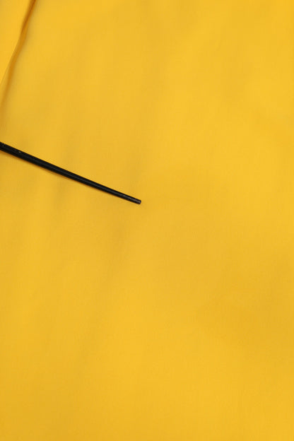 Robe fourreau jaune à épaule dénudée et fente latérale de Dolce & Gabbana