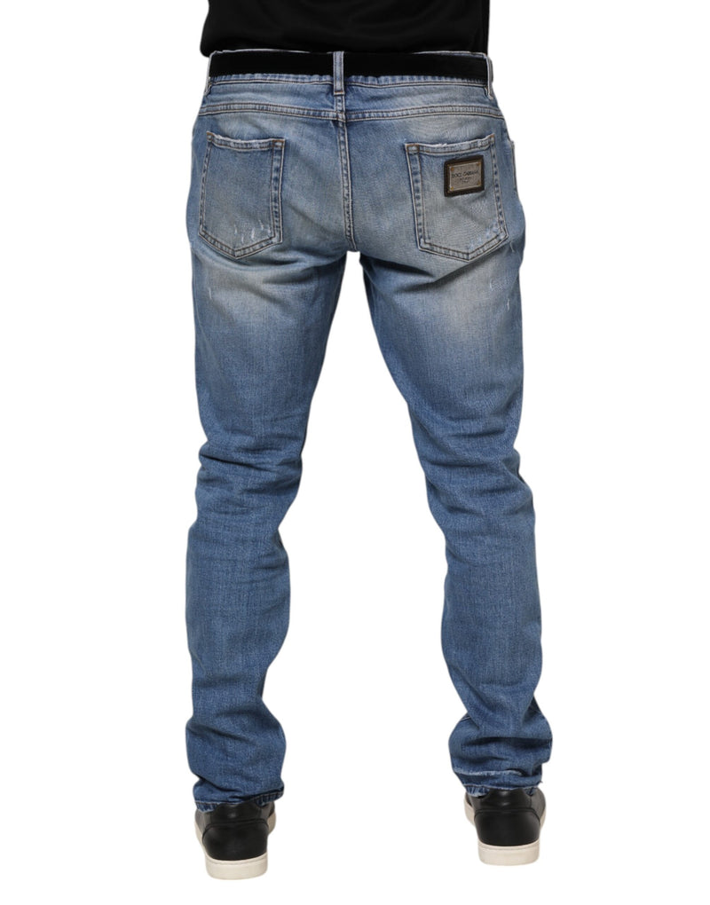 Jeans en jean bleu délavé et déchiré avec plaque logo Dolce &amp; Gabbana