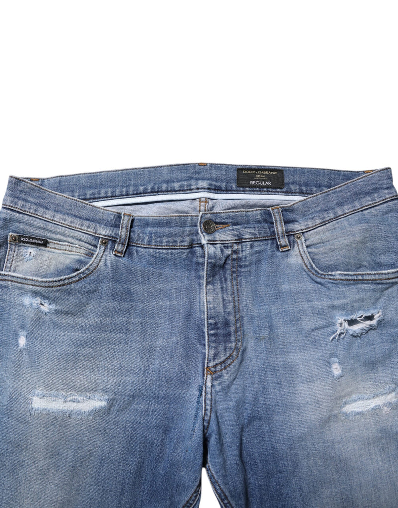 Jeans en jean bleu délavé et déchiré avec plaque logo Dolce &amp; Gabbana
