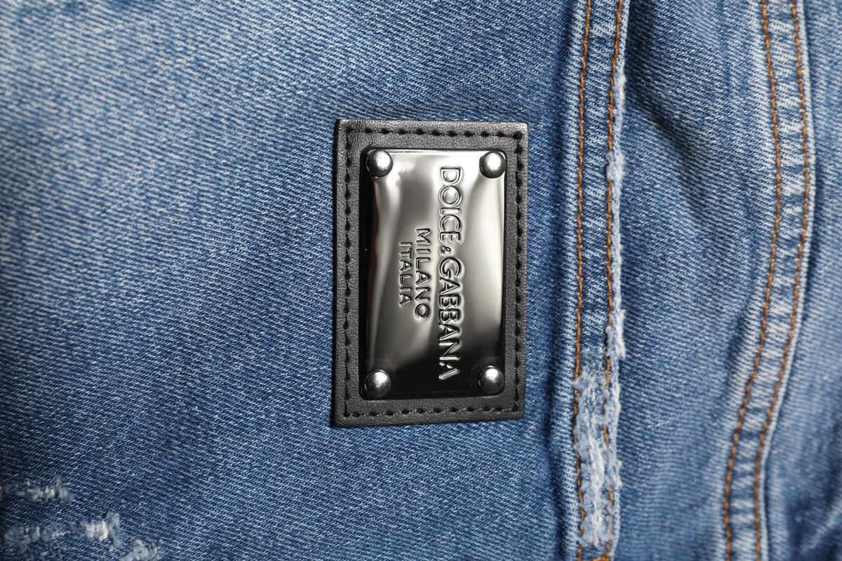 Jeans en coton bleu délavé avec plaque logo Dolce &amp; Gabbana
