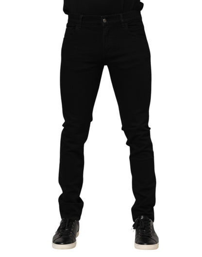 Jeans en jean doré Dolce &amp; Gabbana en coton bleu foncé avec plaque logo.