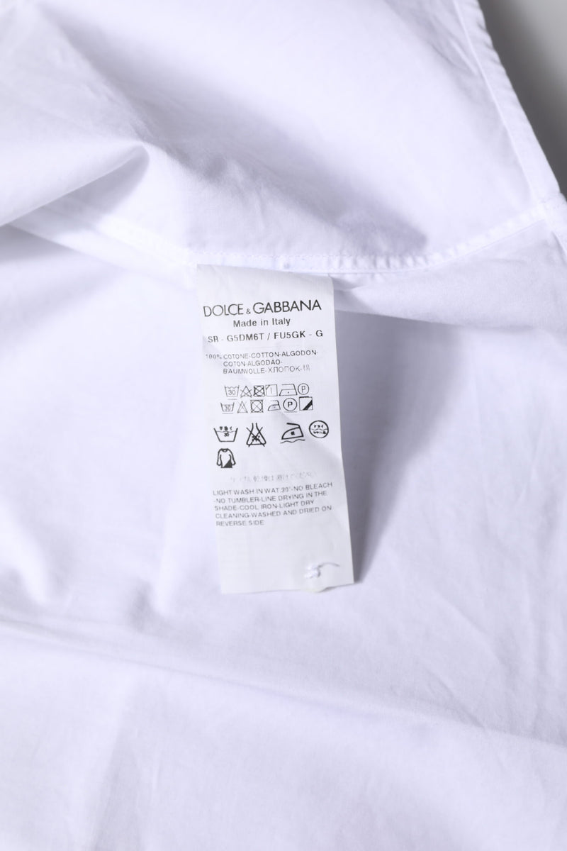 Dolce &amp; Gabbana wit katoenen overhemd met gouden details en lange mouwen.