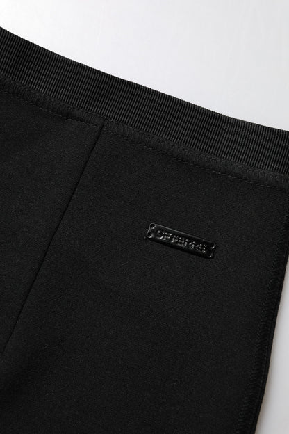 Jupe crayon noire en polyester de GF Ferre, longueur au genou.