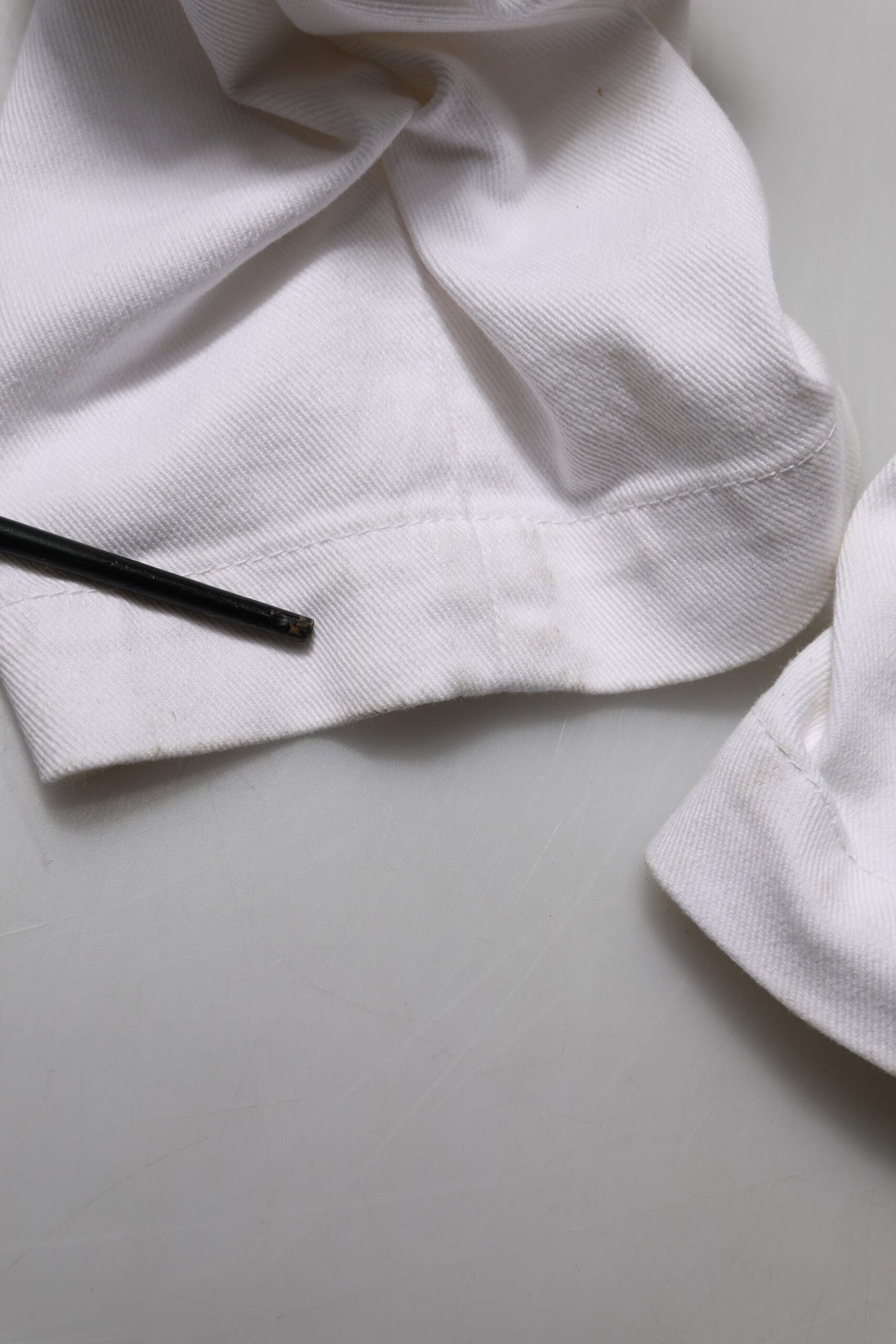 Jean en coton blanc délavé taille haute de Dolce & Gabbana