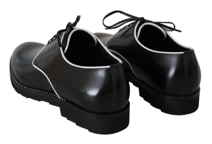 Derbies en cuir noir avec ligne blanche de Dolce & Gabbana
