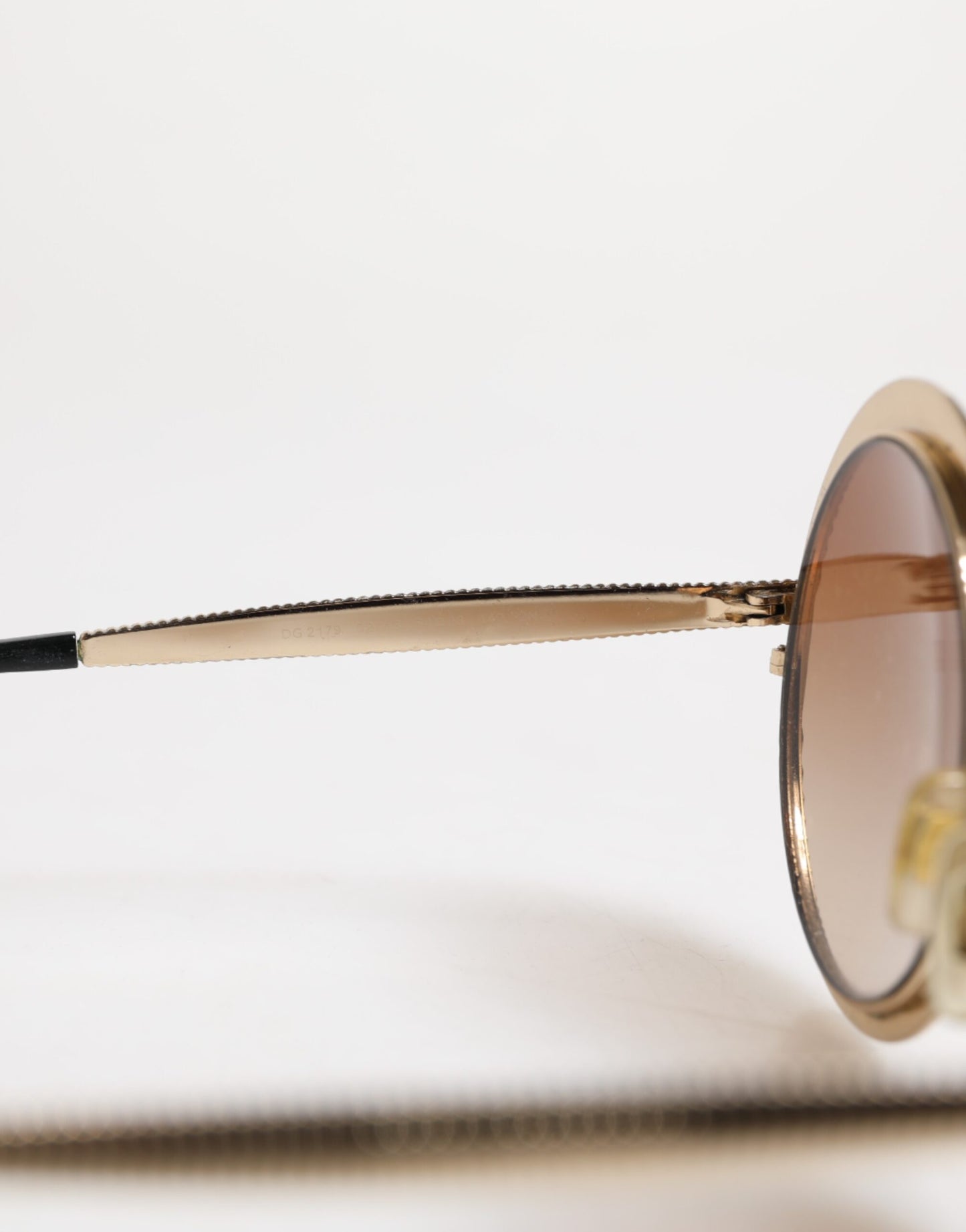 Dolce & Gabbana Goudbruin Gradiënt Rond Montuur DG2179 Eyewear Zonnebril