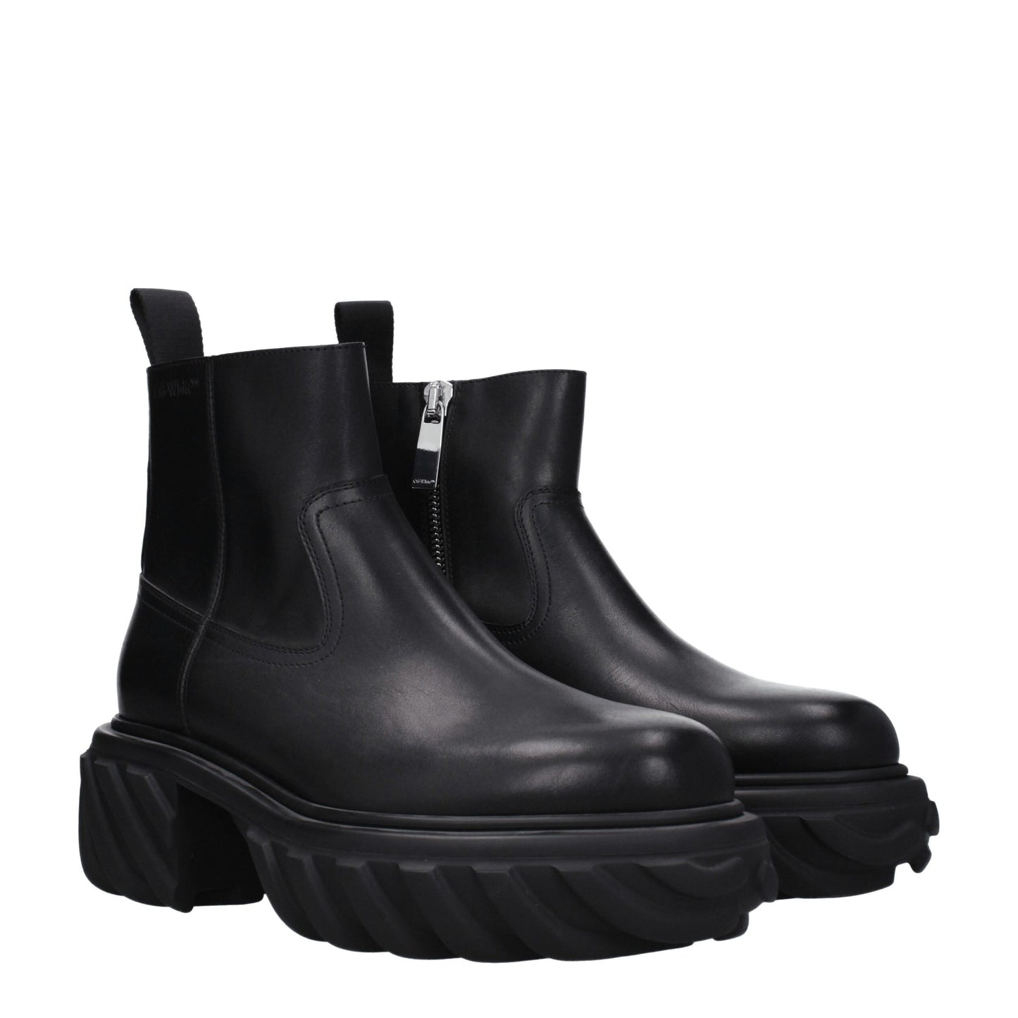 Bottes de cheville en cuir noir et blanc cassé
