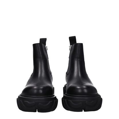 Bottes de cheville en cuir noir et blanc cassé