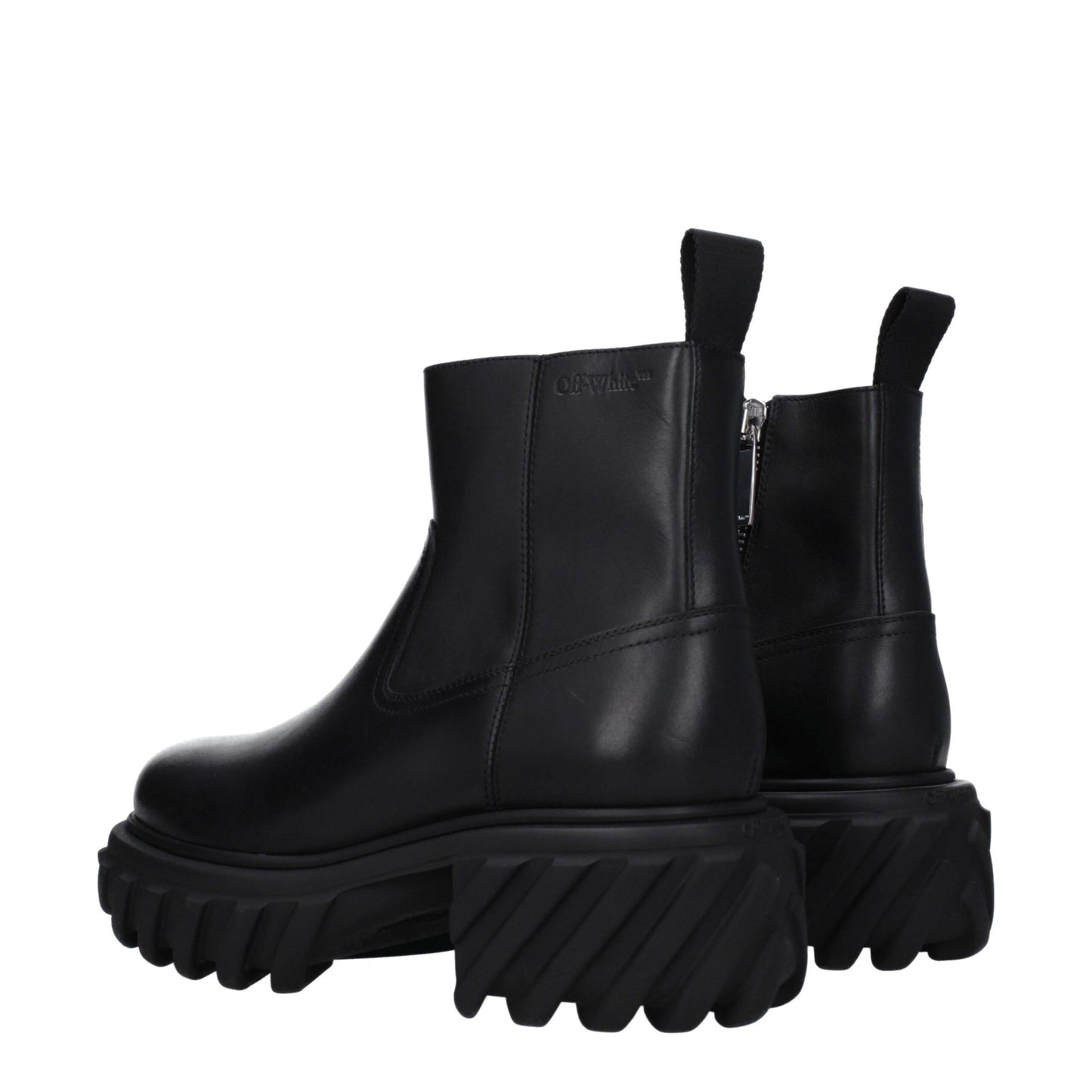 Bottes de cheville en cuir noir et blanc cassé
