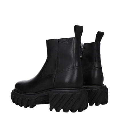Bottes de cheville en cuir noir et blanc cassé