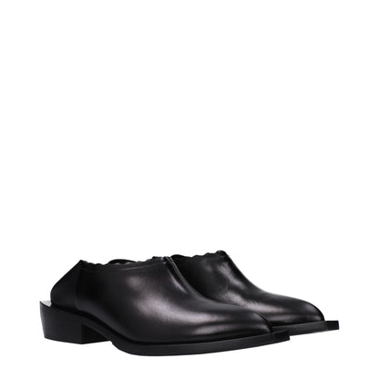 Moschino leren slippers in zwart