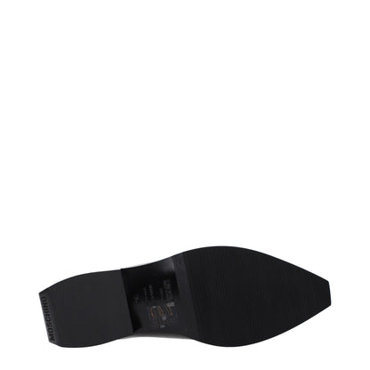 Moschino leren slippers in zwart