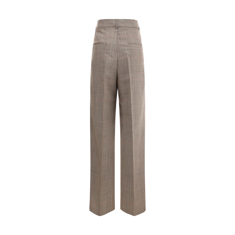 Rohe broek met brede pijpen in het Schotse ruitenpatroon (Prince of Wales)