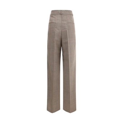 Rohe broek met brede pijpen in het Schotse ruitenpatroon (Prince of Wales)