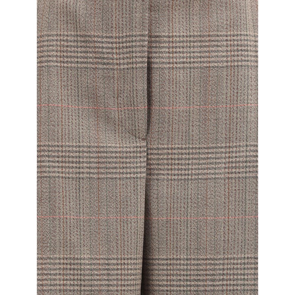 Rohe broek met brede pijpen in het Schotse ruitenpatroon (Prince of Wales)