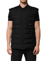 Veste-parka noire sans manches Dolce & Gabbana avec plaque de logo.