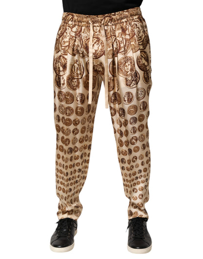Pantalon de jogging en sergé de soie beige à imprimé de pièces de monnaie pour homme de Dolce &amp; Gabbana