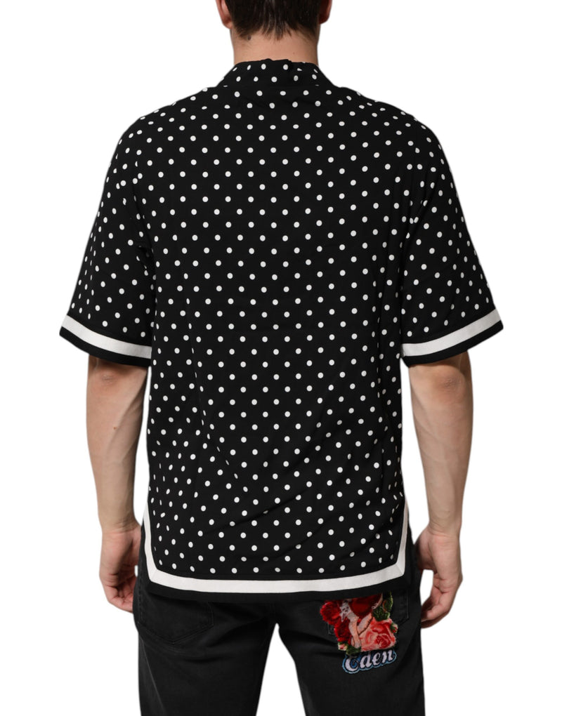 Dolce &amp; Gabbana zwart polkadot polo-shirt met korte mouwen en kraag.