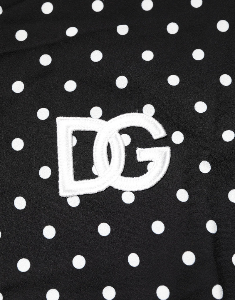 Dolce &amp; Gabbana zwart polkadot polo-shirt met korte mouwen en kraag.