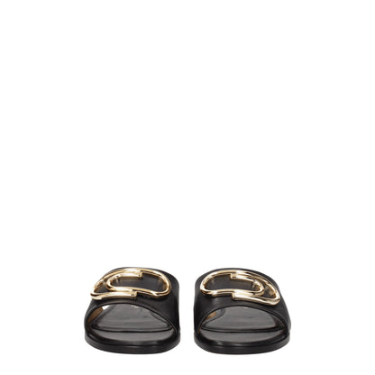 Slippers/sandalen van zwart en wit leder