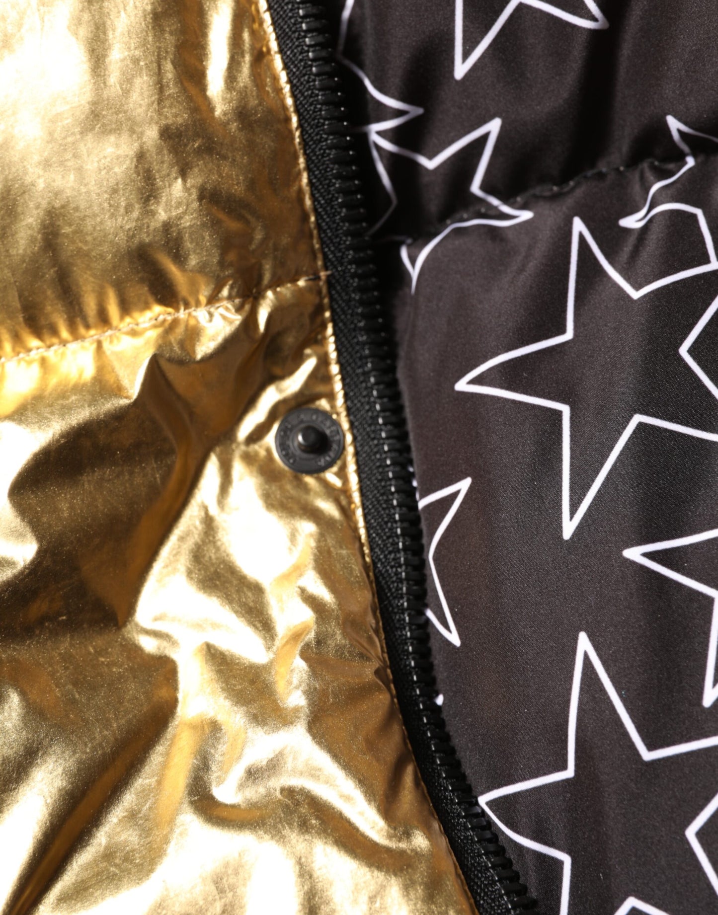 Veste matelassée à capuche dorée et à fermeture éclair intégrale de Dolce & Gabbana